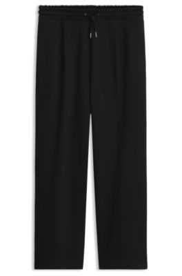 Pantalones de ch&aacute;ndal relaxed fit de felpa de algod&oacute;n, Negro
