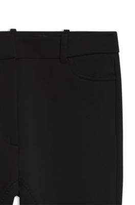 Stirrup-hem pants, Black