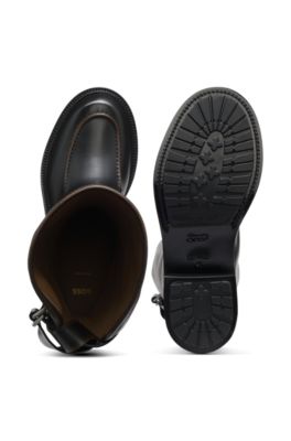 Botas de piel, Negro