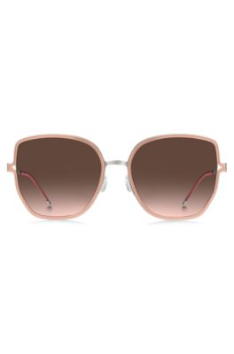 Nude-frame sunglasses with forked temples and branded chain