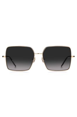 Gold-tone sunglasses with black end-tips