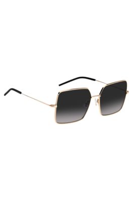 Gold-tone sunglasses with black end-tips