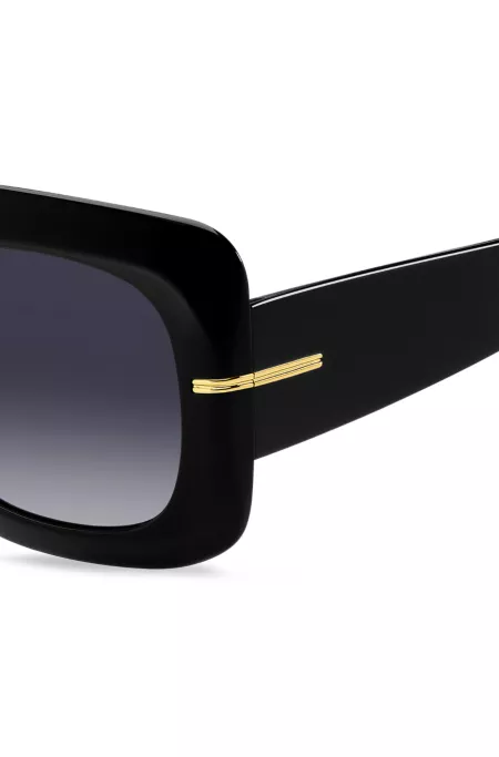 Black-acetate sunglasses with gold-tone hinges