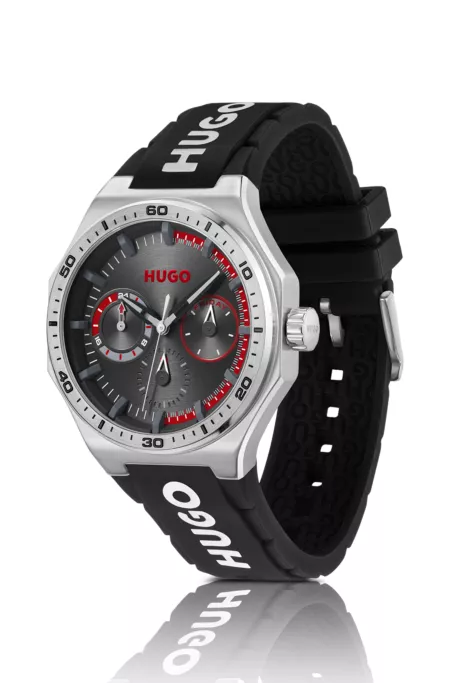 Silver-tone watch with silicone logo strap