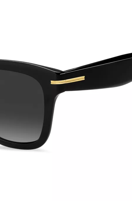 Black-acetate sunglasses with gold-tone detail
