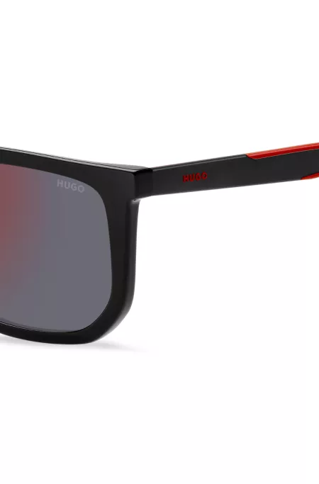 Black-acetate sunglasses with two-tone end tips