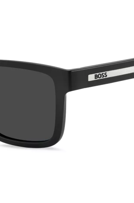 Matte-black sunglasses with logo insert
