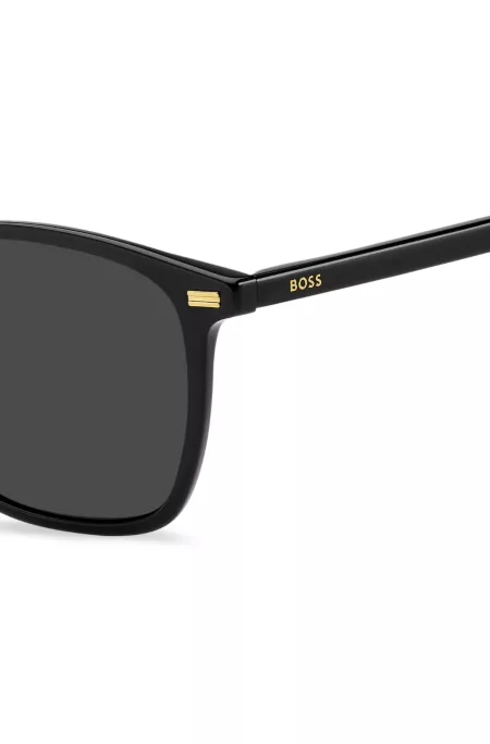 Black-acetate sunglasses with temple logo