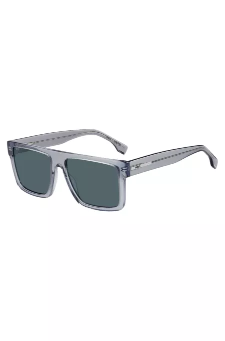 Transparent-blue sunglasses with logo plaque