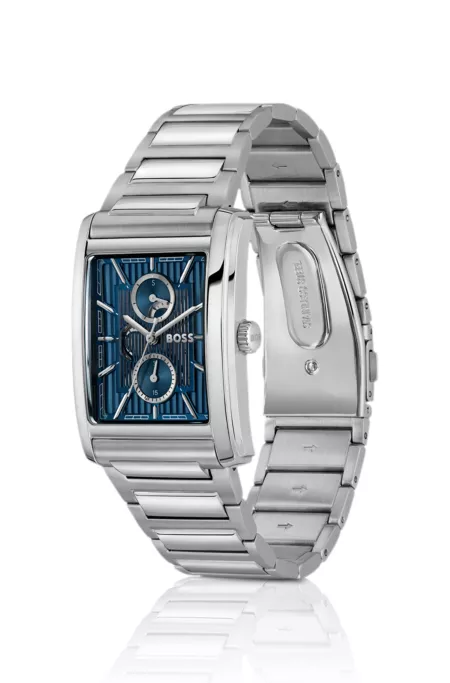 Link-bracelet watch with blue textured skeleton dial
