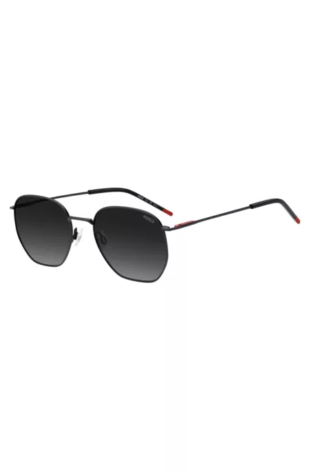 Matte-black sunglasses in stainless steel with red details