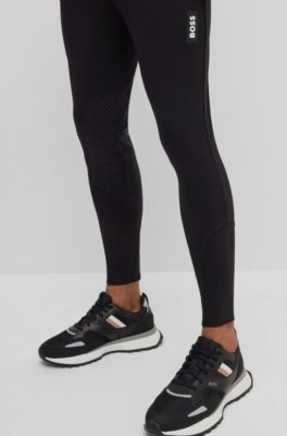 Pantalones de equitaci&oacute;n de material superel&aacute;stico con agarre especial en las rodillas, Negro