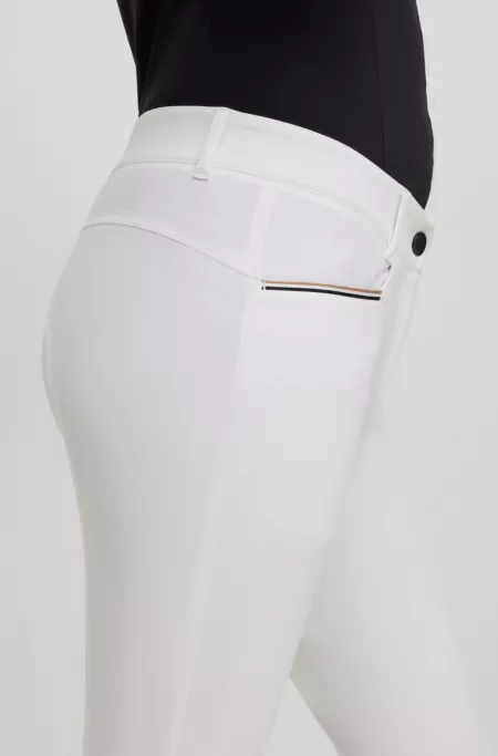 Equestrian full-grip breeches in power-stretch material