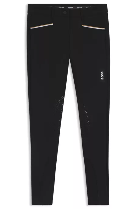 Equestrian full-grip breeches in power-stretch material