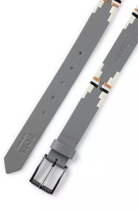 Equestrian polo belt with embroidered pattern