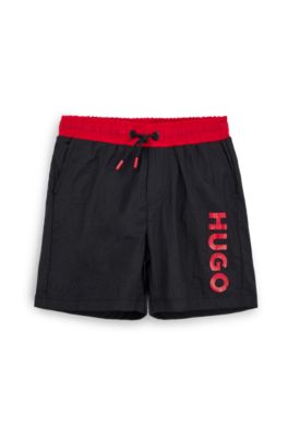 Kids' swim shorts with vertical logo print, Black