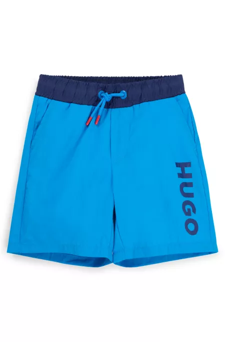 Kids' swim shorts with vertical logo print