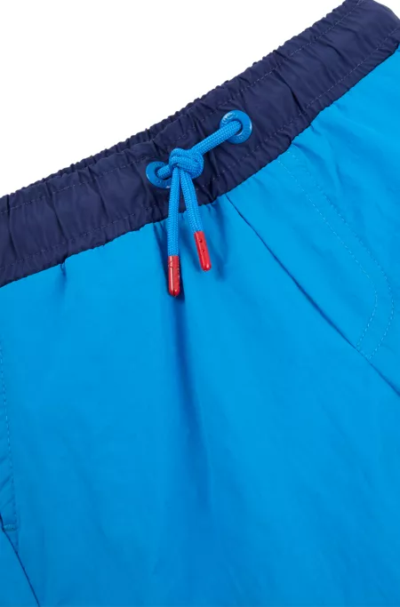 Kids' swim shorts with vertical logo print