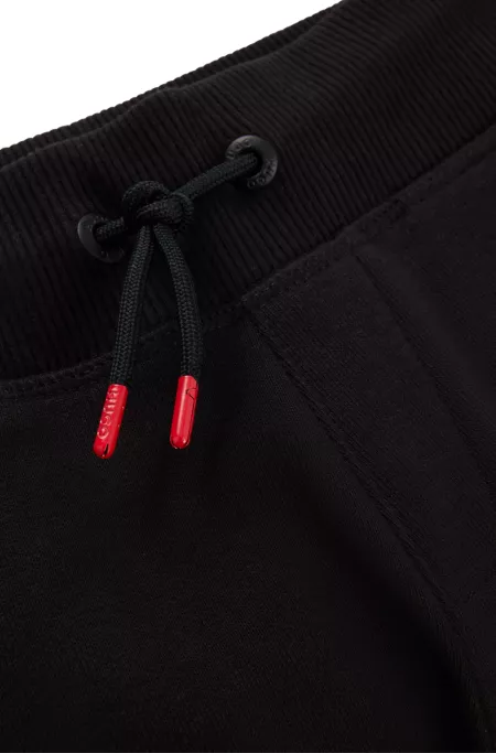 Kids' logo-print tracksuit bottoms in a cotton blend