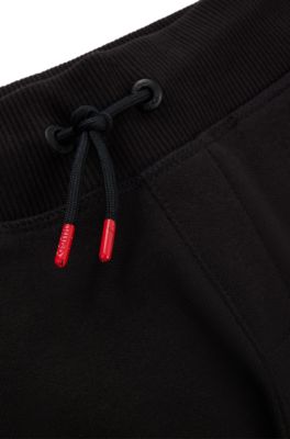 Kids' logo-print tracksuit bottoms in a cotton blend, Black