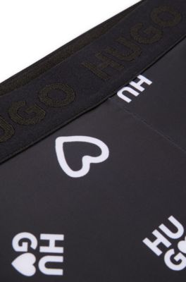 Kids' stretch leggings with logo and hearts print, Black