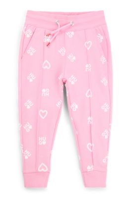 Kids' cotton-blend tracksuit bottoms with logos and hearts, Pink
