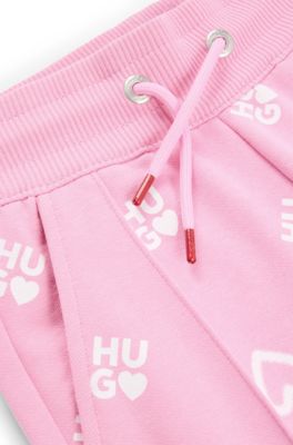 Kids' cotton-blend tracksuit bottoms with logos and hearts, Pink
