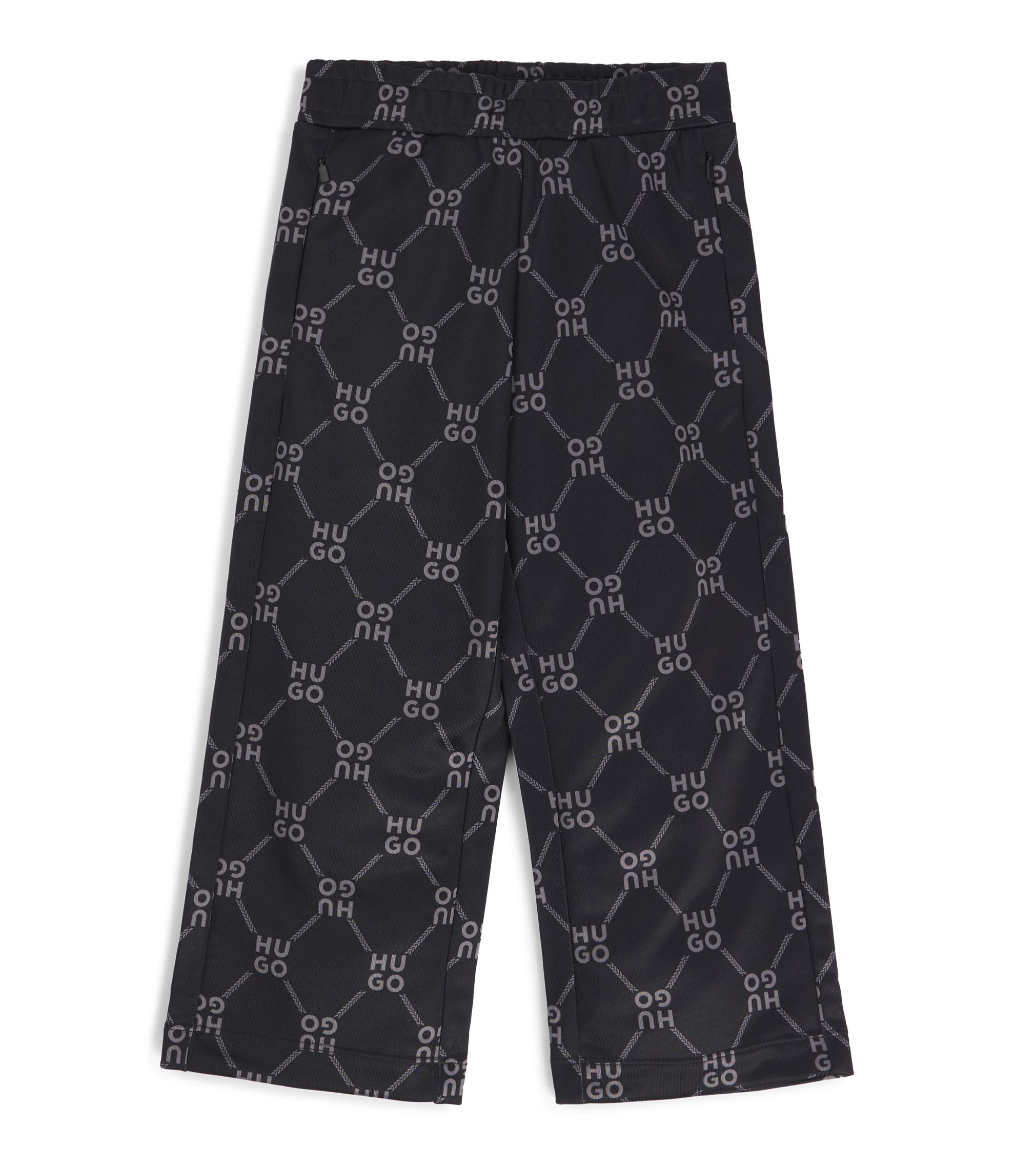 Kids' loose-fit tracksuit bottoms with stacked-logo print