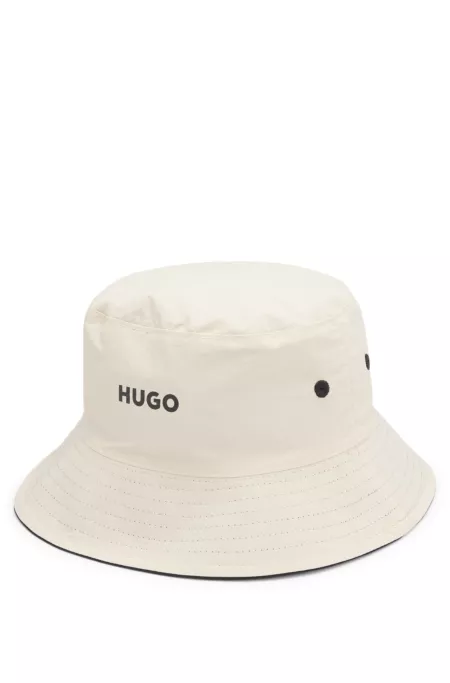 Kids' reversible bucket hat in ripstop and cotton