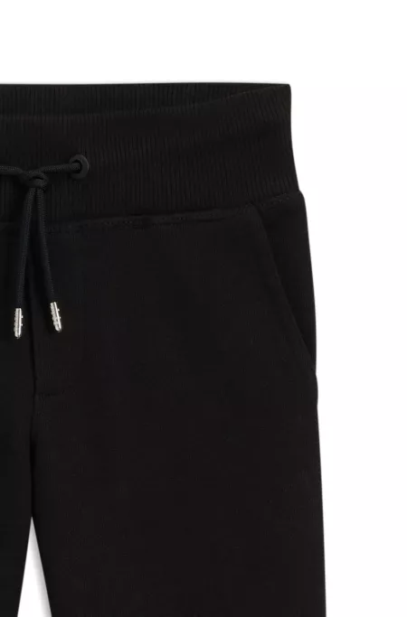 Kids' logo-print tracksuit bottoms in a cotton blend