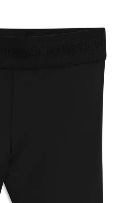Kids' jersey leggings with stud logo