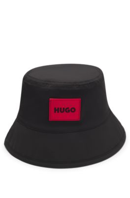 Kids' reversible bucket hat with logos, Black