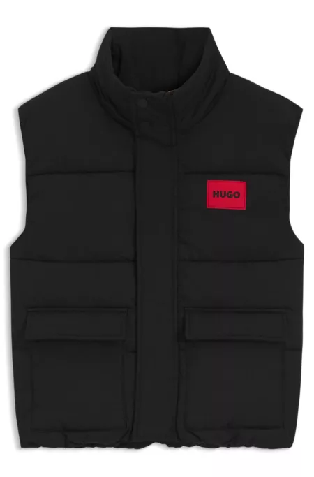 Kids' padded vest with red logo badge