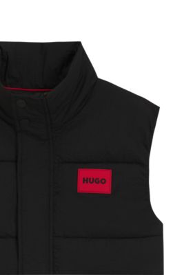 Kids' padded vest with red logo badge, Black
