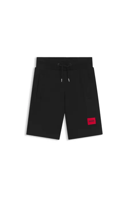 Kids' fleece shorts with logo label