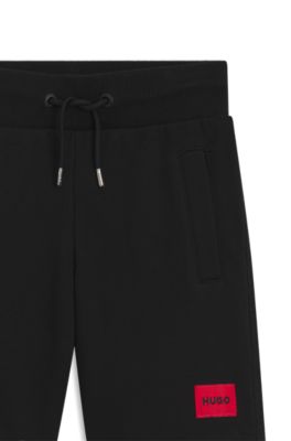 Kids' fleece shorts with logo label, Black