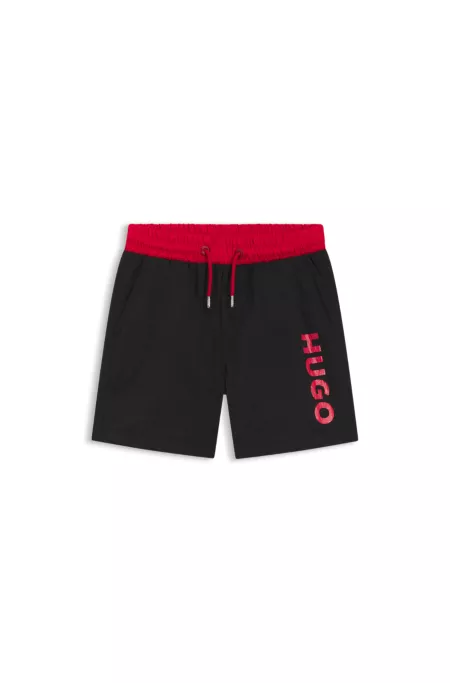 Kids' swim shorts with contrast logo print