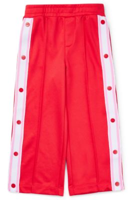HUGO Kids' tracksuit bottoms with pressstud side seams