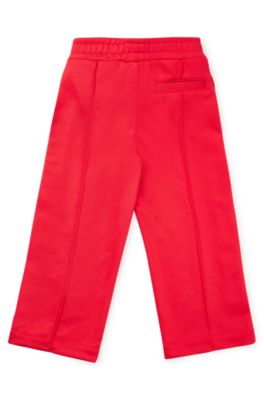 HUGO Kids' tracksuit bottoms with pressstud side seams