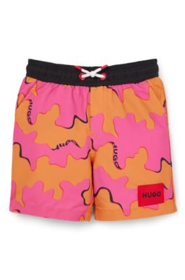Kids' swim shorts with logo and seasonal print, Patterned