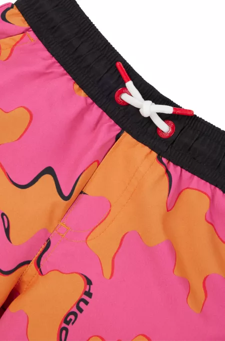 Kids' swim shorts with logo and seasonal print
