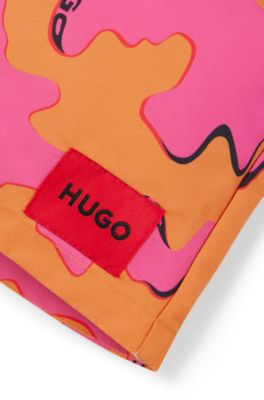 Kids' swim shorts with logo and seasonal print, Patterned