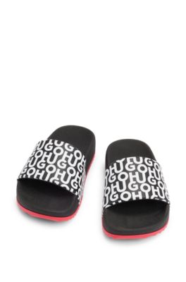Kids' lightweight slides with stacked-logo strap, Black