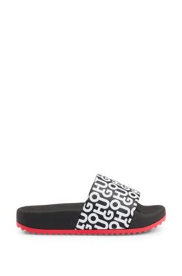 Kids' lightweight slides with stacked-logo strap, Black