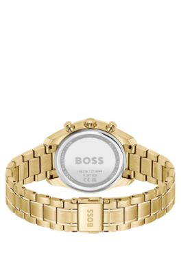 Gold-tone watch with monogram-textured dial