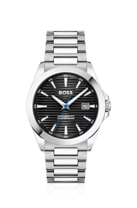 Silver-tone watch with black grooved dial
