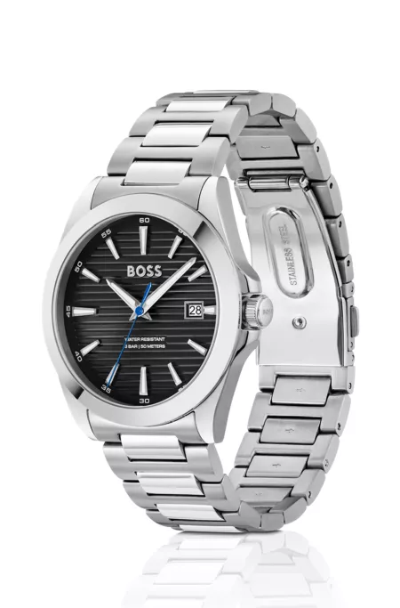 Silver-tone watch with black grooved dial