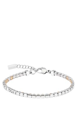 Silver-tone tennis bracelet with clear and champagne crystals