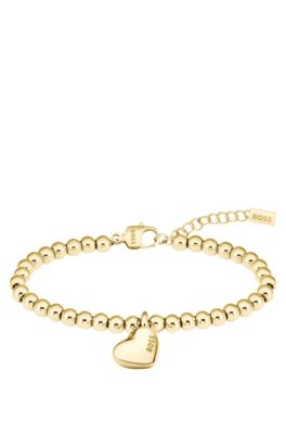 Gold-tone beaded bracelet with logo heart charm