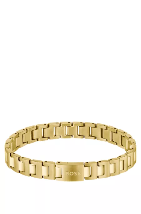 Gold-tone cuff with logo clasp